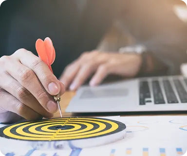 a dart over a target